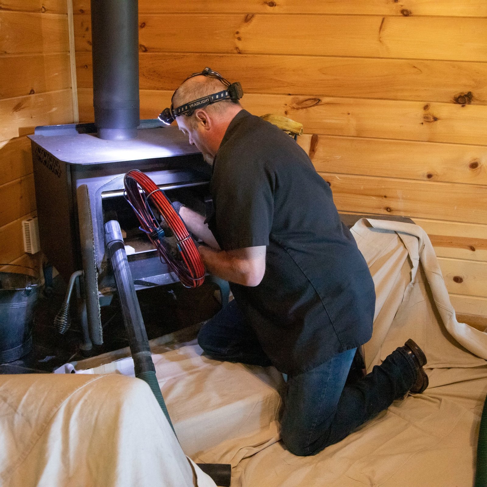 Homeowner enjoying a clean and safe fireplace